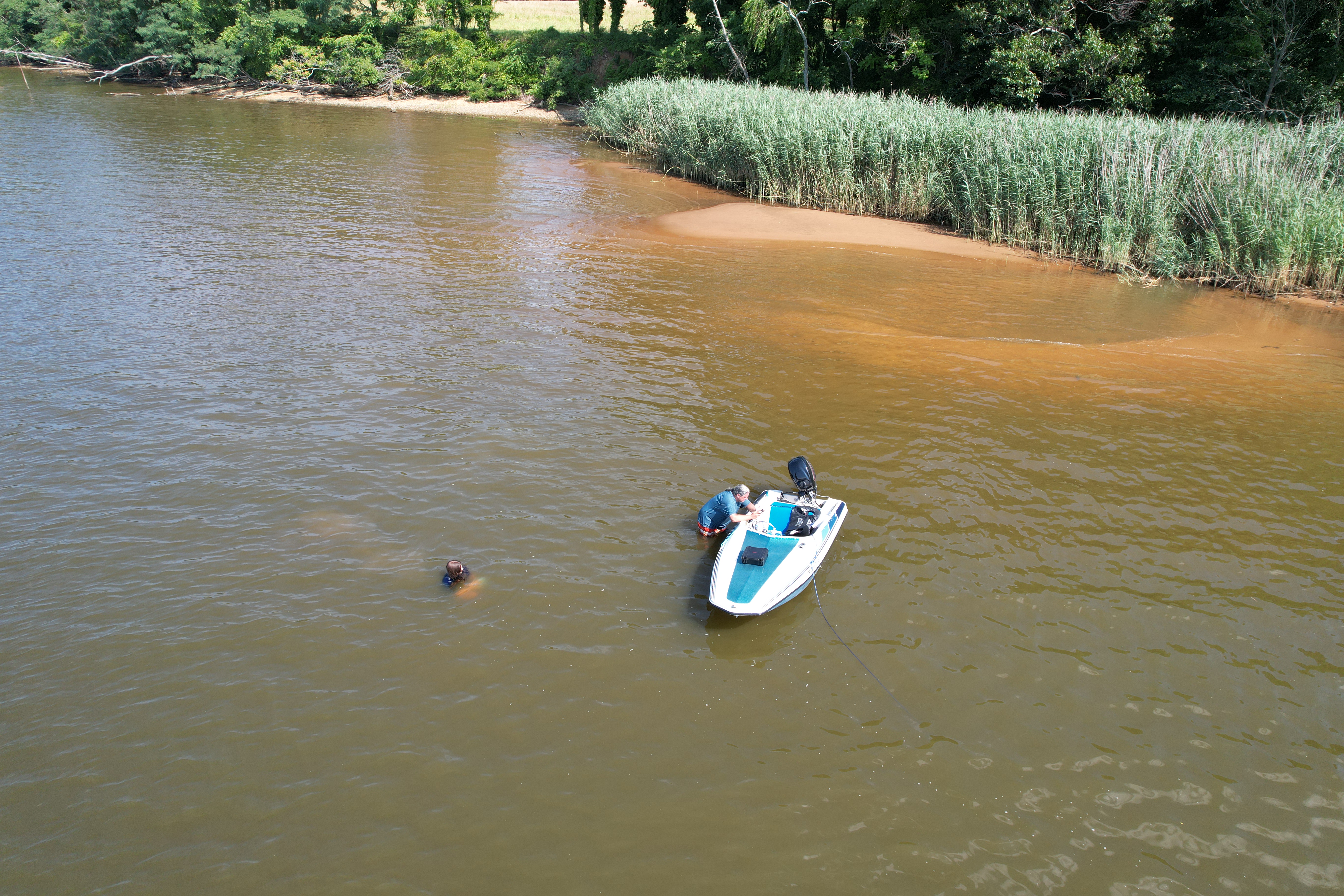 Aerial View of the Sundance Anchored in a Cove