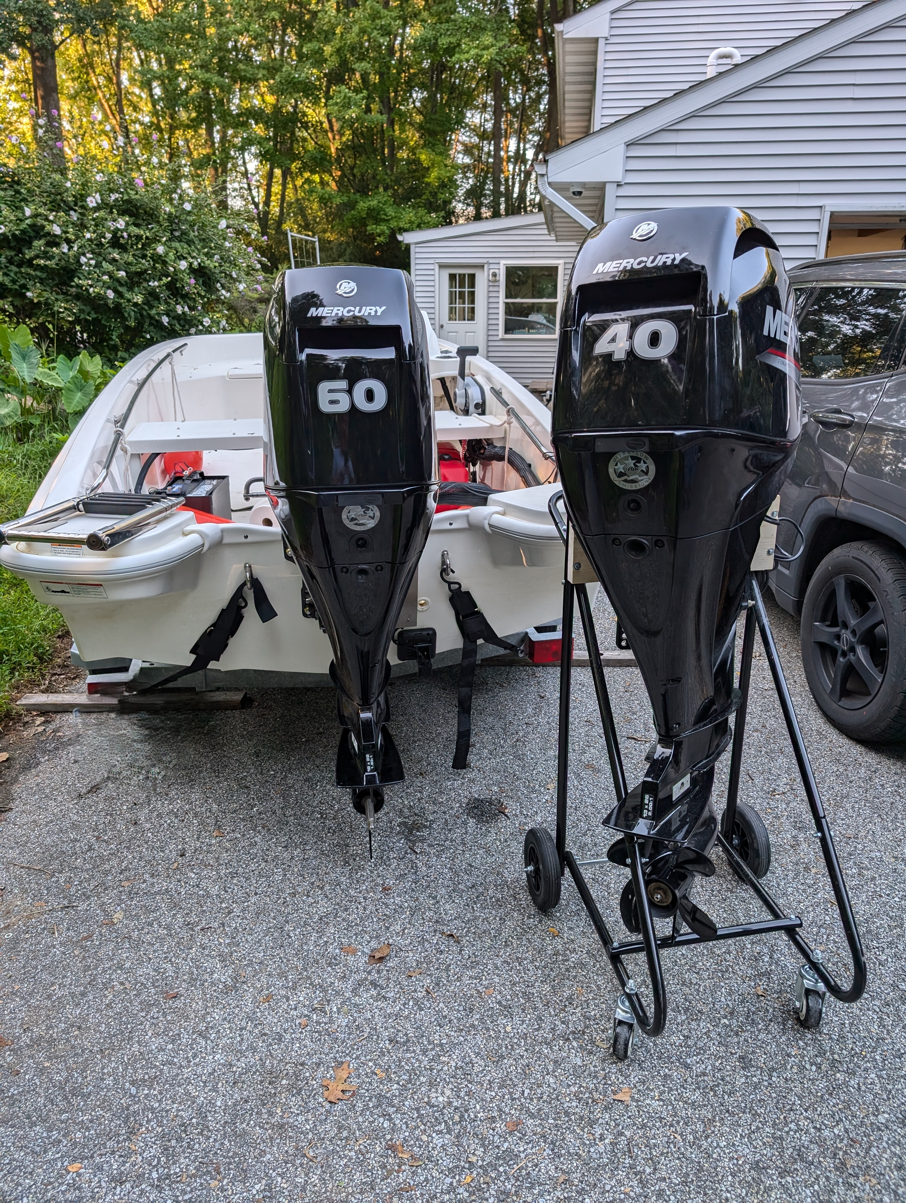 A 40 HP and 60 HP Mercury Side by Side