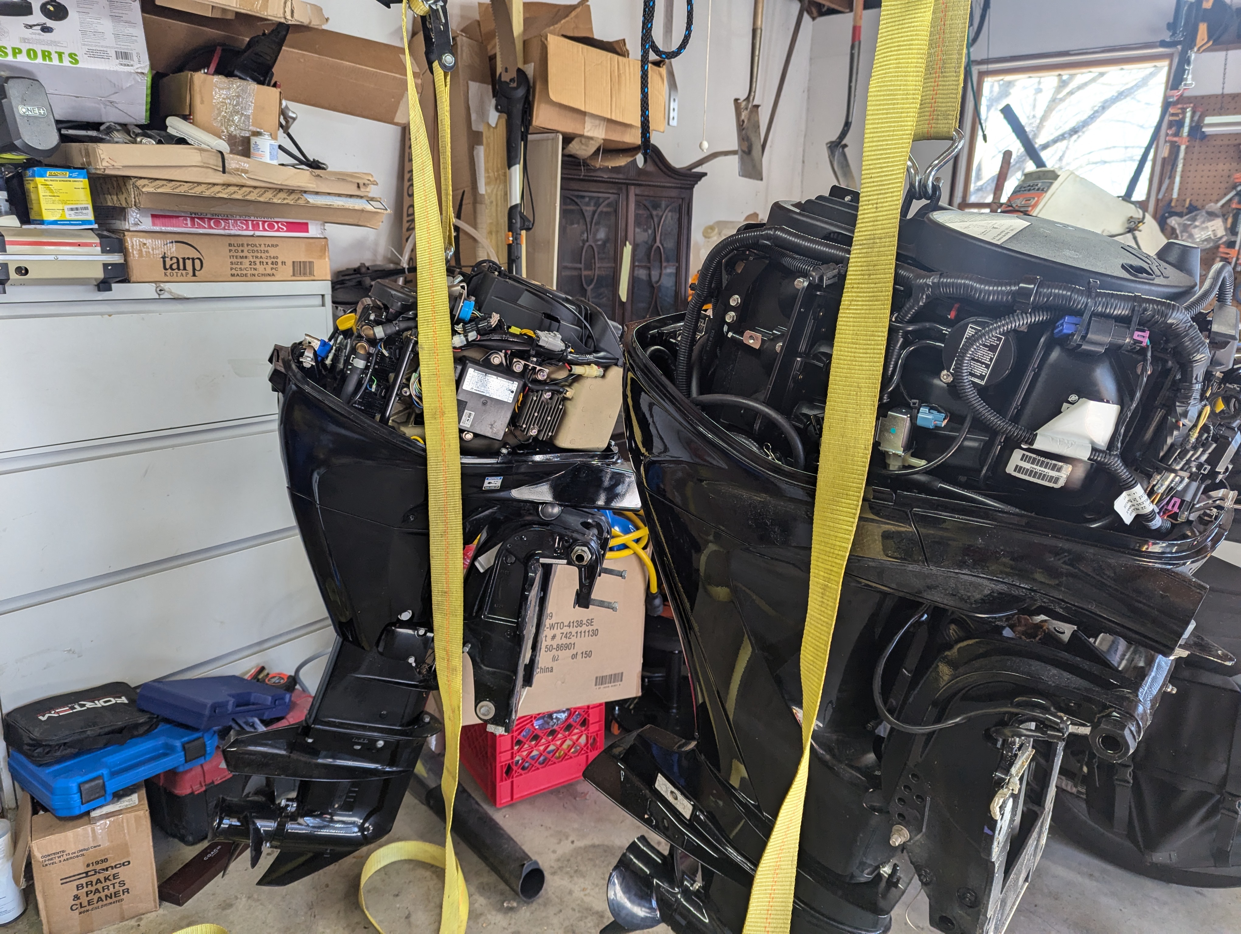30 HP and 40 HP Mercurys Side by Side During the Changeover